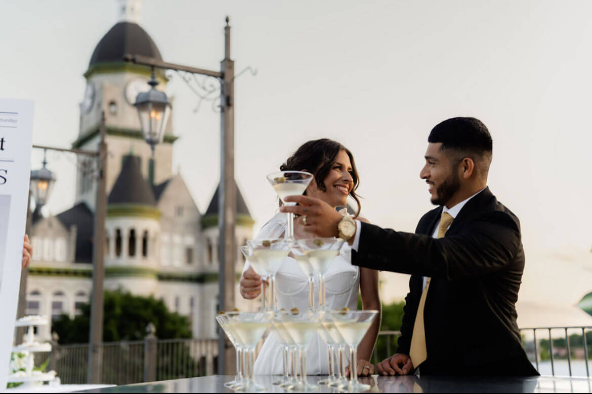 Couple on the rooftop deck at golden hour